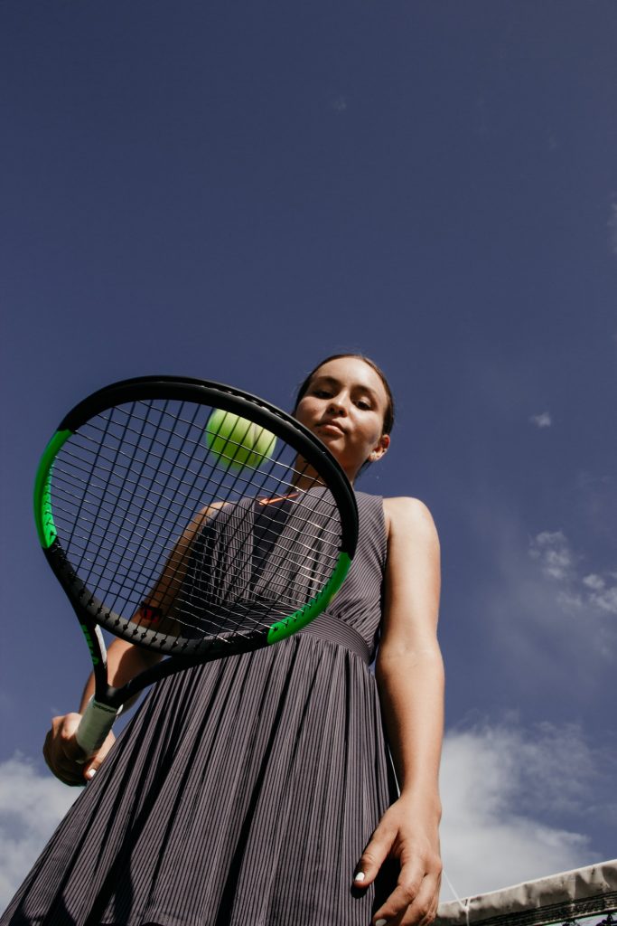 Woman Tossing Ball